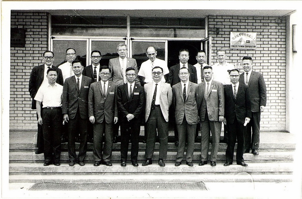 Experts standing in the front of Taiwan Philco Company.